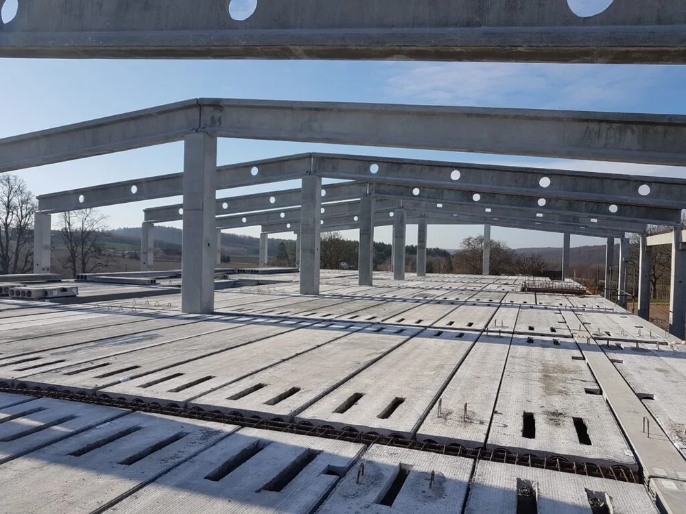 Precast floor slabs and girders on a construction site