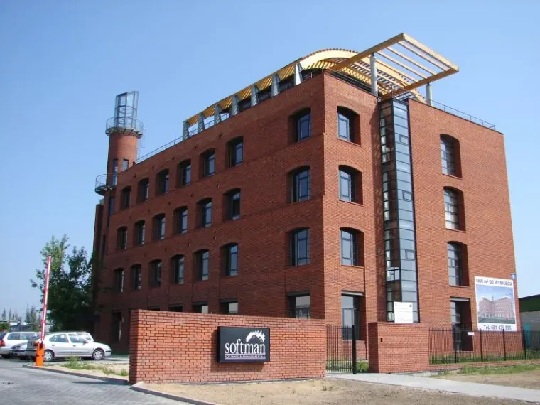 Softman S.A. headquarters - brick office building